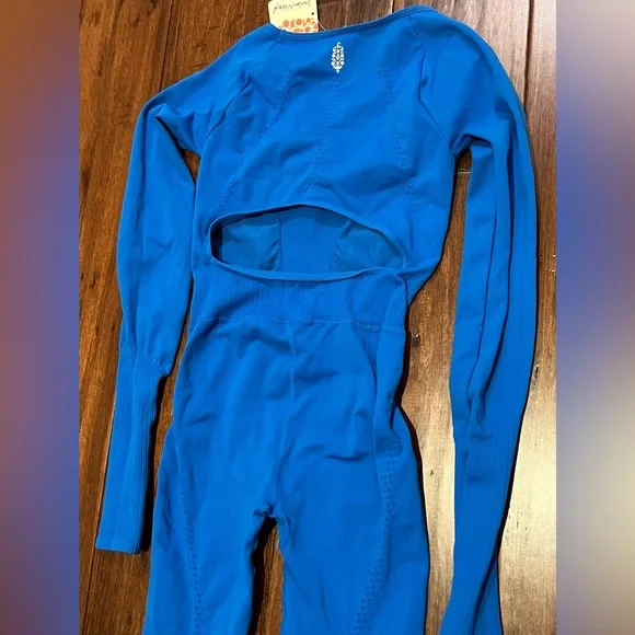 Free People Movement 
Good Karma Collection
Long sleeve onesie cutout 
NWT $118- - Picture 15 of 15